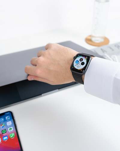 mobile phone person wearing Apple Watch cell phone